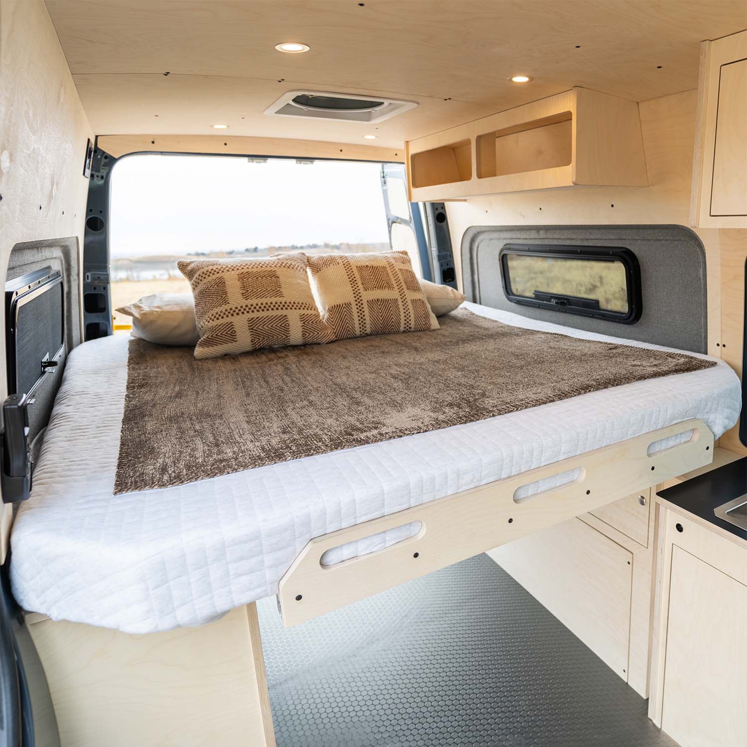 Sprinter Van Bed and Wheel Well Cabinets Camper Van Conversion