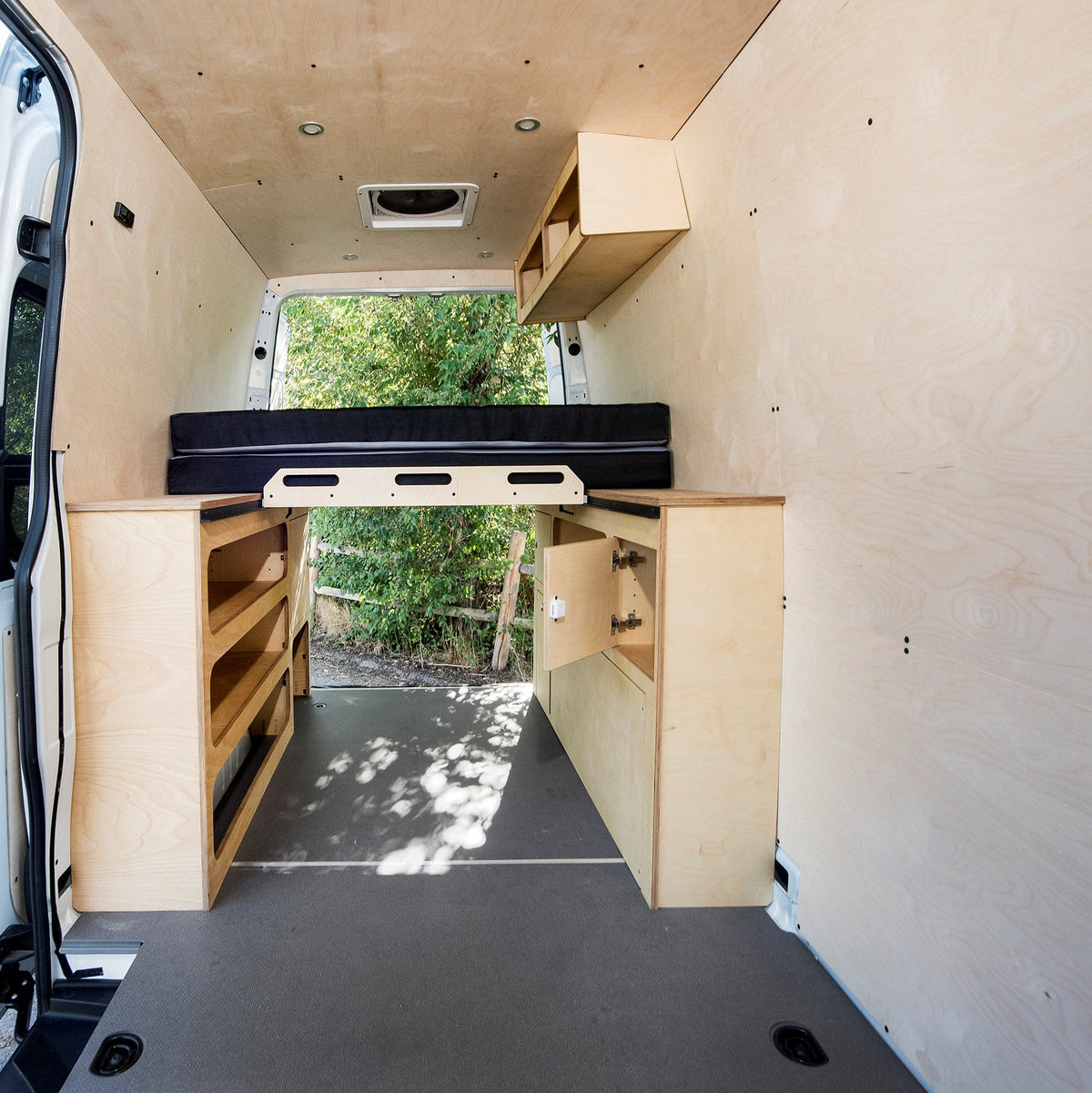 Insulation and wall paneling installed in a camper van